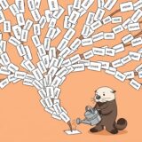 単語カードに水をやると単語の木が育つのを見るラッコ