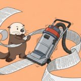 文章の隙間を掃除機で吸い取るラッコ