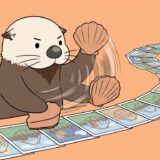 写真にホタテのハンコを押しまくるラッコ