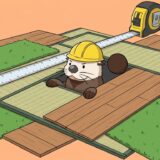 巻き尺を広げて畳やフローリングや芝生を敷き詰めて広さを比べるラッコ